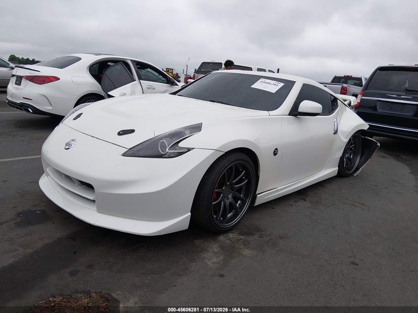 Vin: jn1az4eh9cm561233, lot: 46104704, nissan 370z nismo 20122