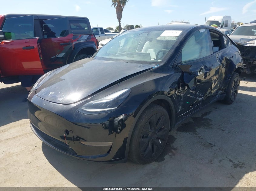 2024 Tesla Model Y, Left Side, IAAI, VIN 7SAYGDEE6RA247869 — photo 2