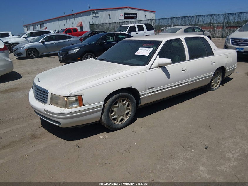 1G6KD54Y9XU720994 1999 Cadillac Deville photo 1