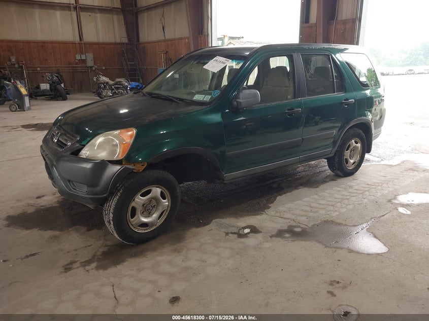 JHLRD78472C001887 2002 Honda Cr-V Lx photo 1