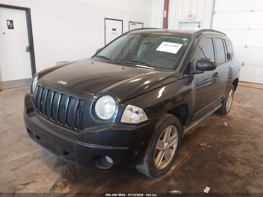1J4NF4FB3AD601539 2010 Jeep Compass Sport photo 1