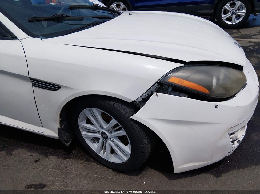 2007 Hyundai Tiburon Gs VIN: KMHHM66D17U255775 Lot: 45625017