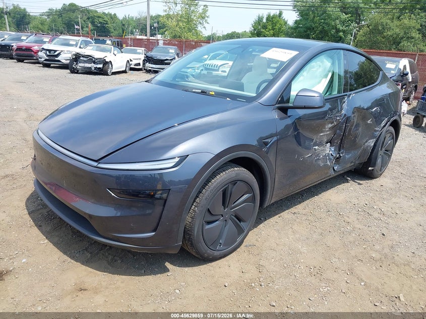 2026 Tesla Model Y, Левый бок, IAAI, VIN 7SAYGDEE9TA454988 — фото 2