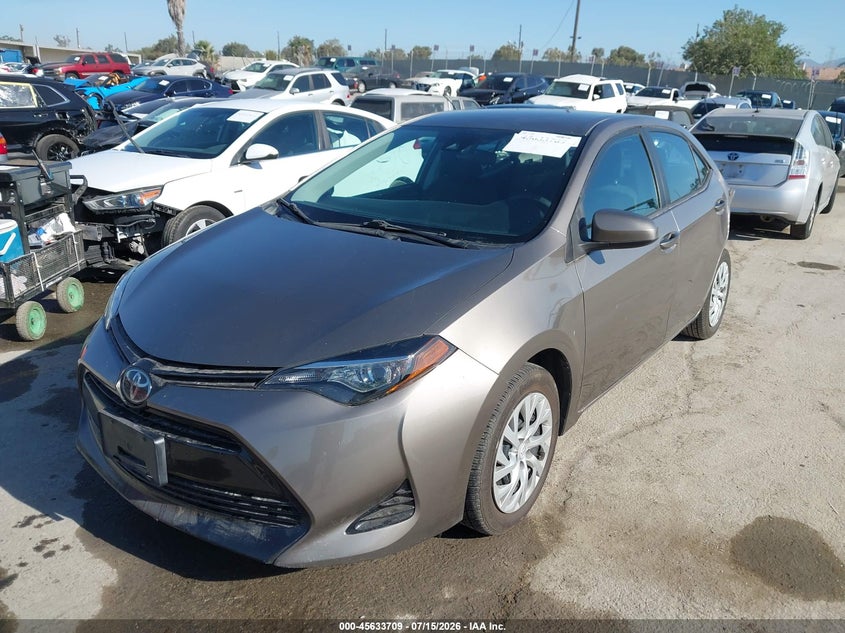 2019 Toyota Corolla, Левый зад, IAAI, VIN 5YFBURHE7KP856664 — фото 2