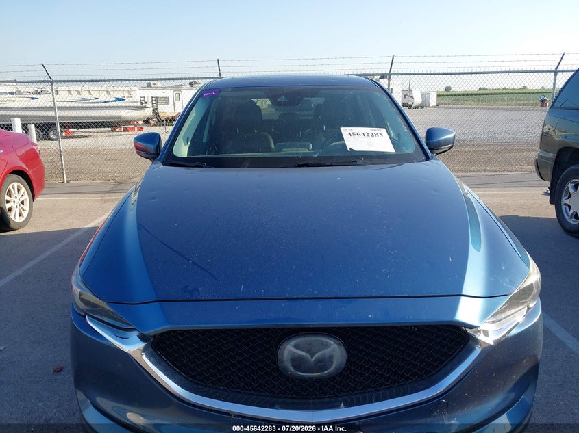 2019 Mazda Cx-5 Grand Touring VIN: JM3KFBDM0K0629977 Lot: 45642283