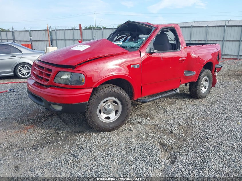 2002 Ford F-150, Rollover, IAAI, VIN 1FTRF08252KE01269 — photo 2
