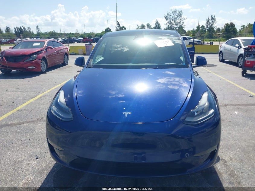 2023 Tesla Model Y Awd/Long Range Dual Motor All-Wheel Drive VIN: 7SAYGAEE5PF844381 Lot: 45643384
