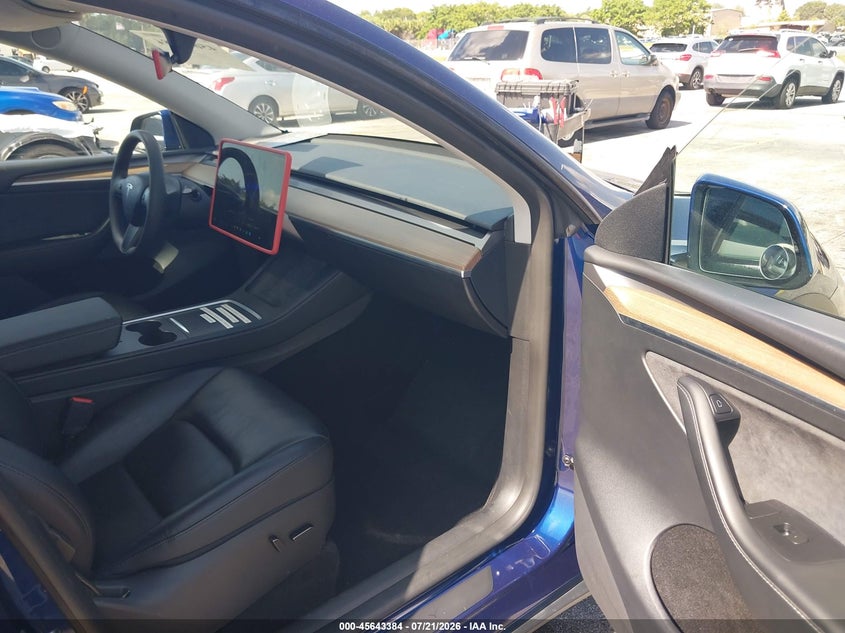 2023 Tesla Model Y Awd/Long Range Dual Motor All-Wheel Drive VIN: 7SAYGAEE5PF844381 Lot: 45643384