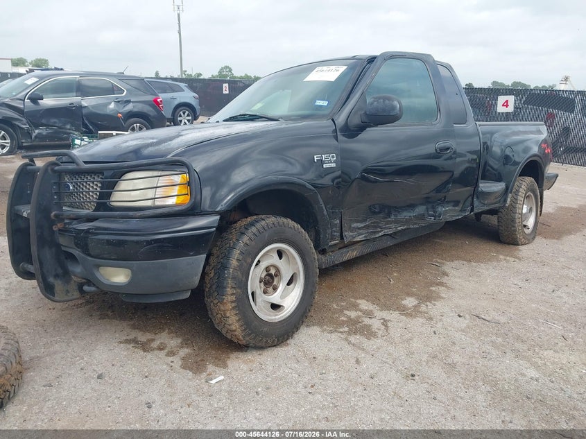 2000 Ford F-150, Оба бока, IAAI, VIN 1FTRX08L3YKB05813 — фото 2