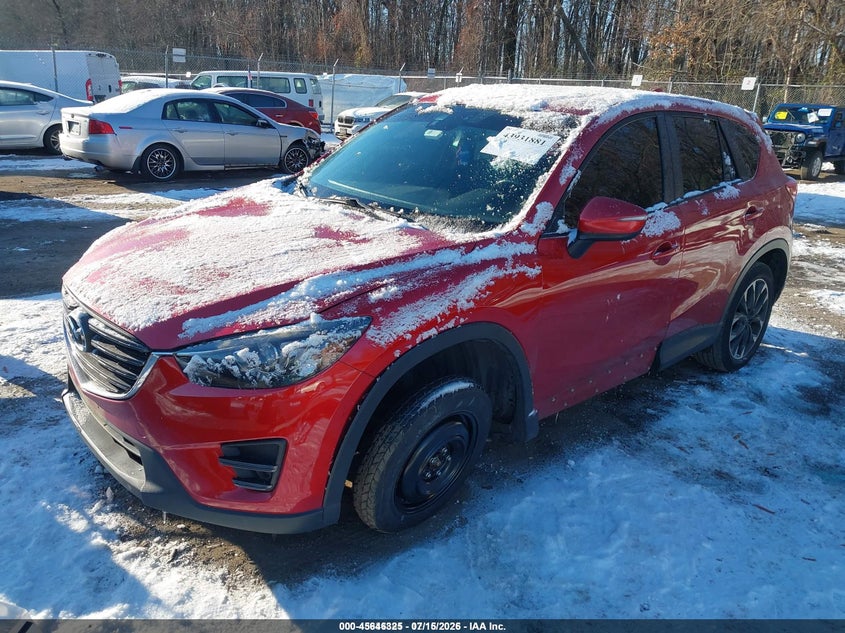 2016 Mazda CX-5, Left Front, IAAI, VIN JM3KE4DY1G0652483 — photo 2