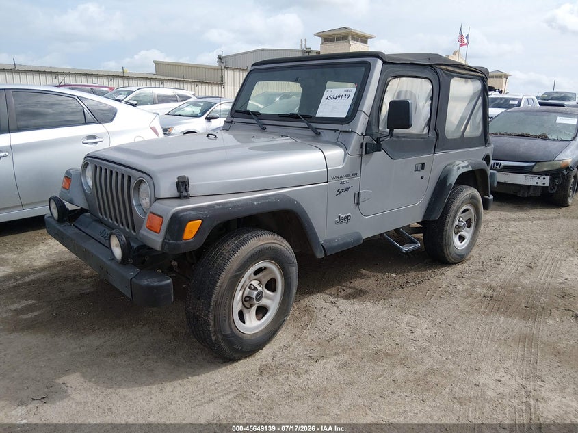 2000 Jeep Wrangler Sport 1J4FA49S6YP729782 photo 1