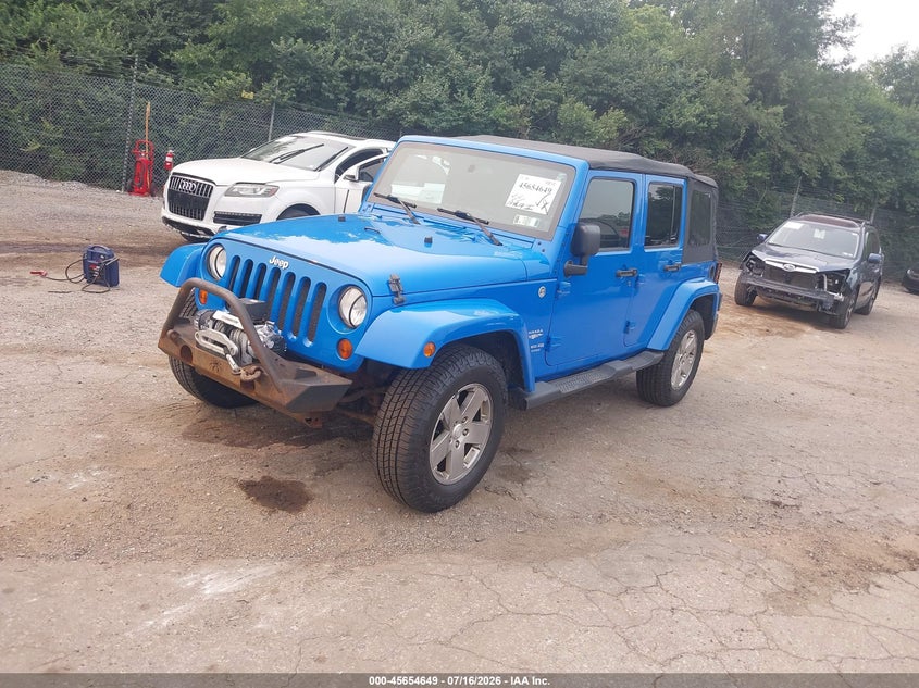 2011 Jeep Wrangler Unlimited Sahara 1J4BA5H11BL563361 photo 1