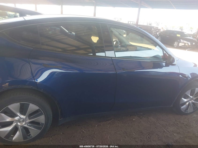 2023 Tesla Model Y Awd/Long Range Dual Motor All-Wheel Drive VIN: 7SAYGAEE7PF897471 Lot: 45656739