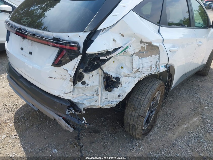 2025 HYUNDAI TUCSON HYBRID auction photo 6