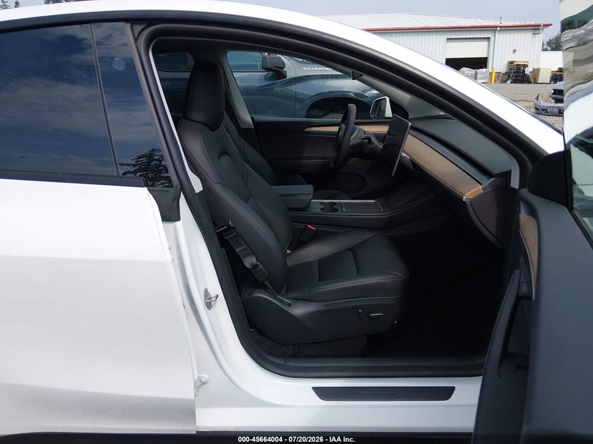 2024 Tesla Model Y Long Range Dual Motor All-Wheel Drive VIN: 7SAYGDEEXRA219721 Lot: 45664004