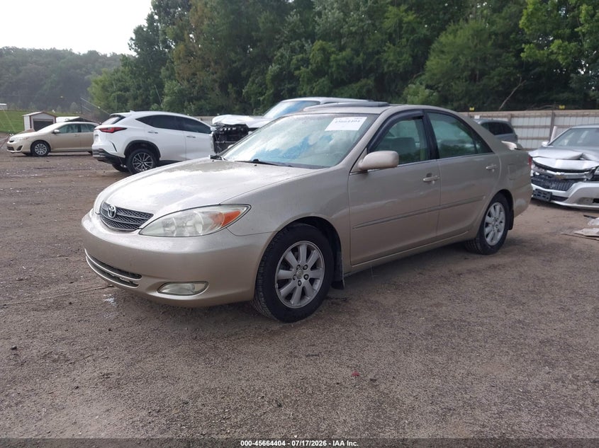 2002 Toyota Camry, Rear, IAAI, VIN 4T1BE30K12U587247 — photo 2