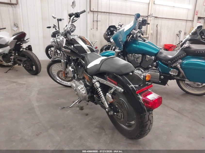 2009 Harley-Davidson Xl1200 C VIN: 1HD1CT3139K450629 Lot: 45665808
