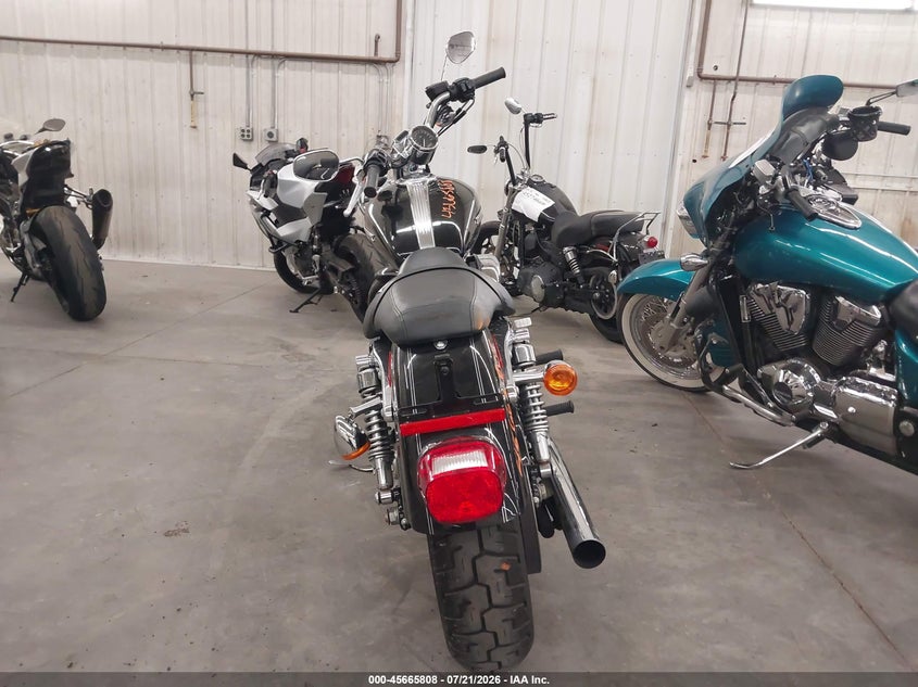 2009 Harley-Davidson Xl1200 C VIN: 1HD1CT3139K450629 Lot: 45665808