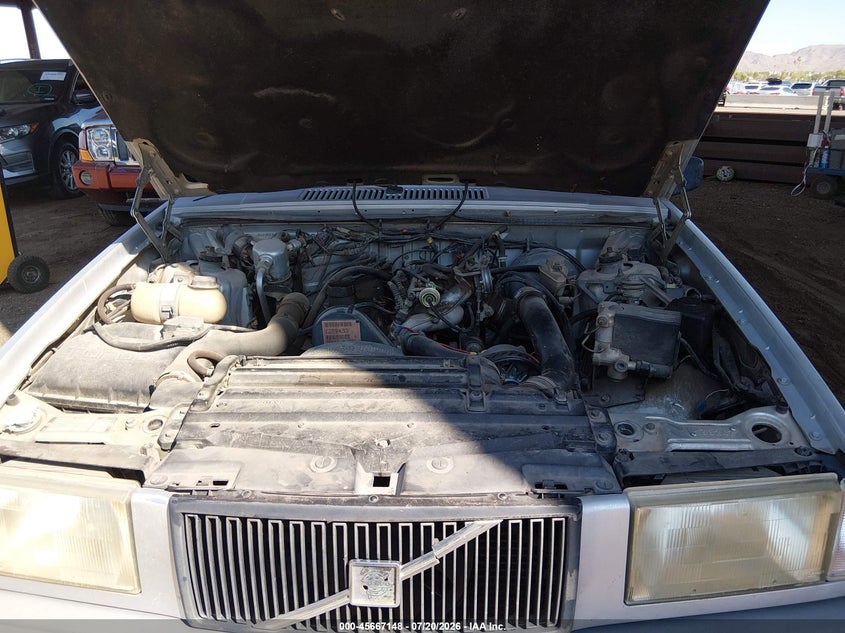 1991 Volvo 740 Se VIN: YV1FA8756M2327434 Lot: 45667148