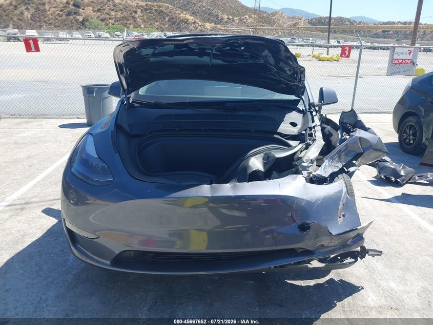 2023 Tesla Model Y Awd/Long Range Dual Motor All-Wheel Drive VIN: 7SAYGAEEXPF620474 Lot: 45667652