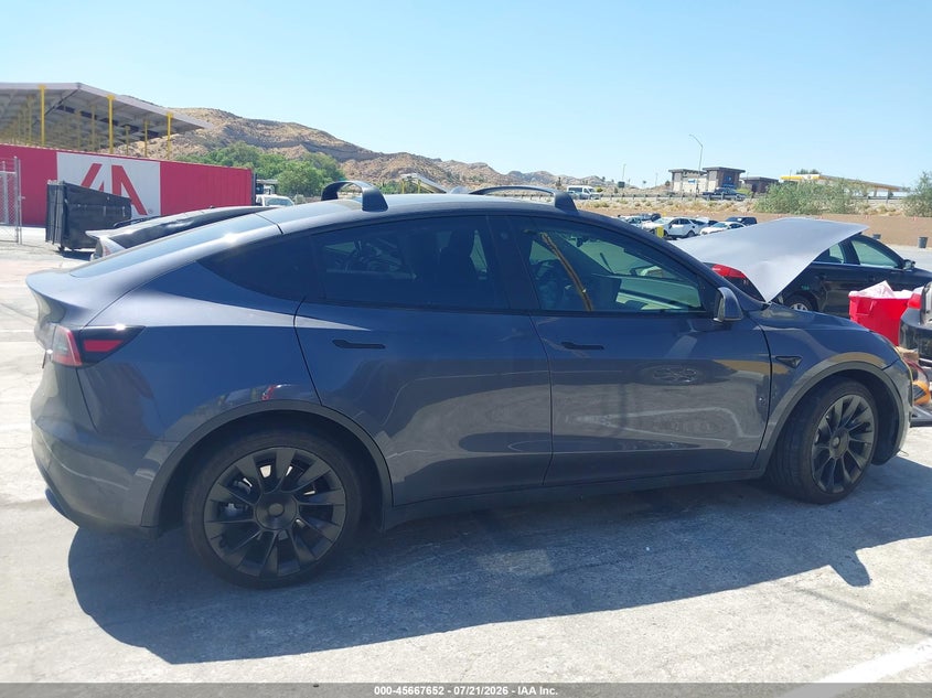 2023 Tesla Model Y Awd/Long Range Dual Motor All-Wheel Drive VIN: 7SAYGAEEXPF620474 Lot: 45667652