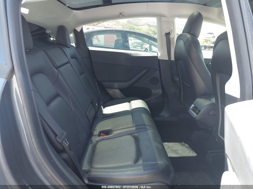2023 Tesla Model Y Awd/Long Range Dual Motor All-Wheel Drive VIN: 7SAYGAEEXPF620474 Lot: 45667652