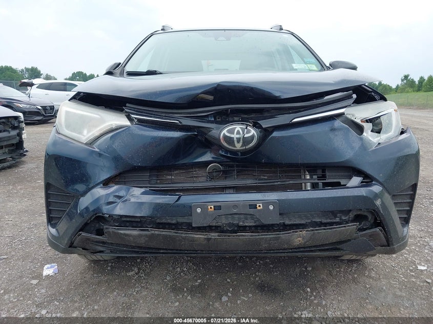 2018 Toyota Rav4 Le VIN: 2T3BFREV7JW793357 Lot: 45670005