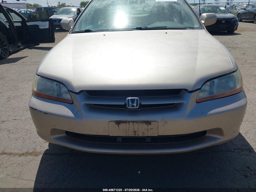 2000 Honda Accord 2.3 Lx VIN: 3HGCG6654YG703740 Lot: 45671225
