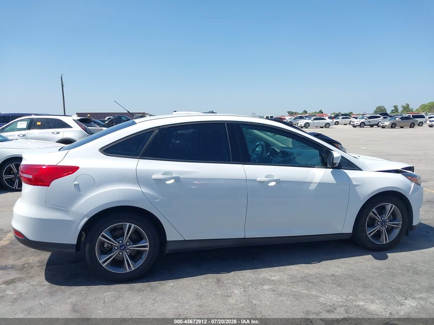 2018 Ford Focus Se VIN: 1FADP3FE0JL236249 Lot: 45672912