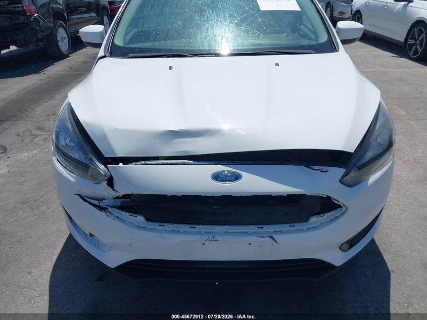2018 Ford Focus Se VIN: 1FADP3FE0JL236249 Lot: 45672912