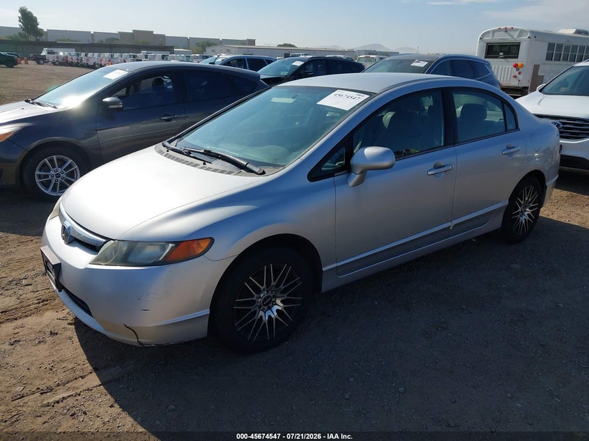 2006 Honda Civic Lx 1HGFA16546L125317 photo 1