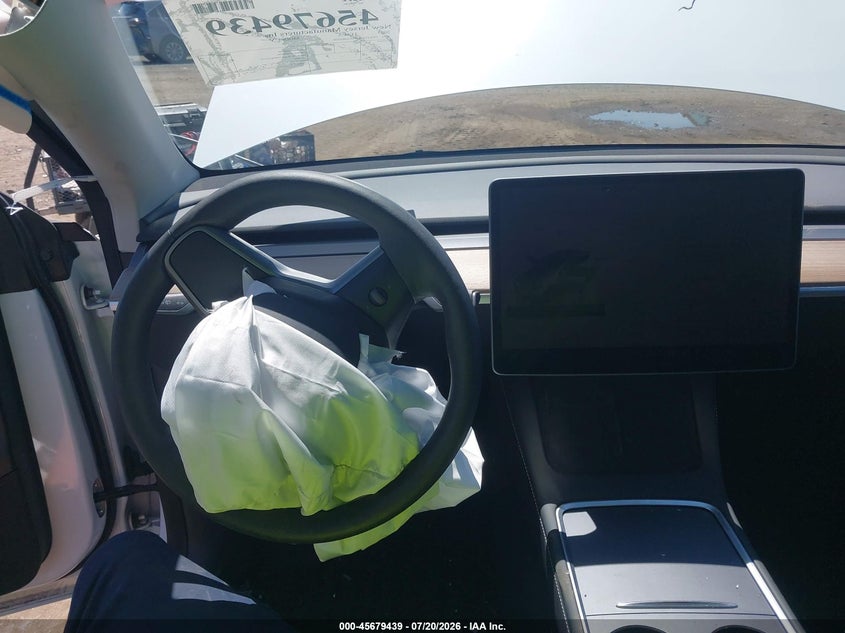 2023 Tesla Model Y Awd/Long Range Dual Motor All-Wheel Drive VIN: 7SAYGDEE5PA065500 Lot: 45679439