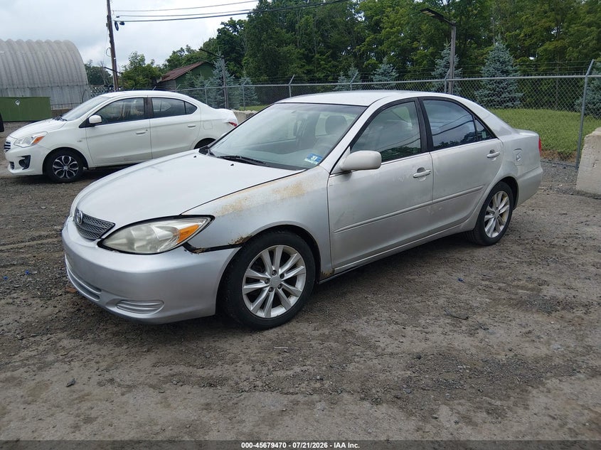 2002 Toyota Camry Le 4T1BF32K62U506642 photo 1