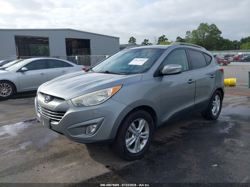 2013 Hyundai Tucson, Normal Wear & Tear, IAAI, VIN KM8JUCAC6DU731805 — photo 2