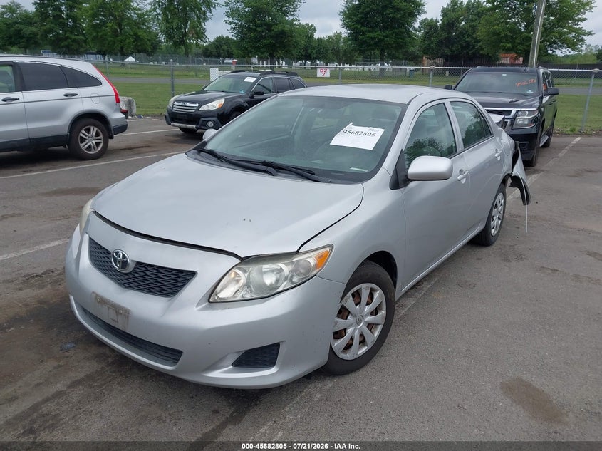 2009 Toyota Corolla, Front & Rear, IAAI, VIN 1NXBU40E99Z007207 — photo 2