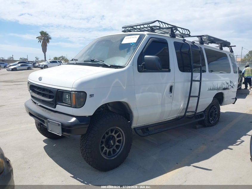 1999 Ford Econoline, Left Rear, IAAI, VIN 1FBSS31L4XHA67472 — photo 2