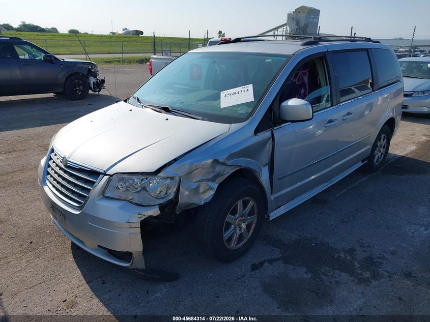 Vin: 2a4rr5d18ar131983, lot: 46182923, chrysler town & country touring 20102