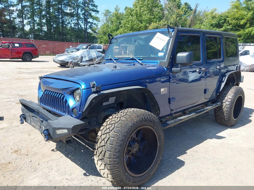 2009 Jeep Wrangler Unlimited Sahara, Right Front, IAAI, VIN 1J4GA59199L781644 — photo 2