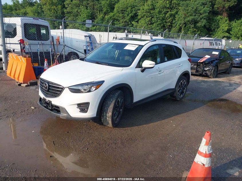 2016 Mazda CX-5, Right Front, IAAI, VIN JM3KE4DY4G0608445 — photo 2