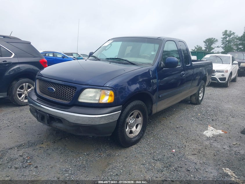 2002 Ford F-150, Normal Wear & Tear, IAAI, VIN 1FTRX17282NB38343 — photo 2