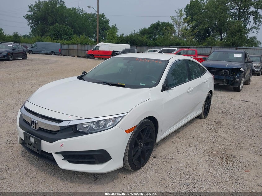 2017 Honda Civic, Vandalized, IAAI, VIN 2HGFC2E52HH563030 — photo 2