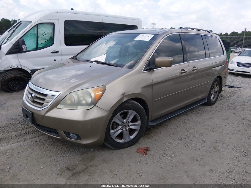 Vin: 5fnrl3h95ab051001, lot: 46216429, honda odyssey touring 20102