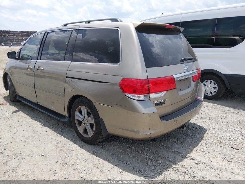 Vin: 5fnrl3h95ab051001, lot: 46216429, honda odyssey touring 20103