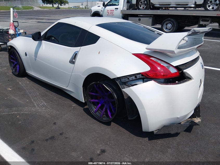 Vin: jn1az4eh3em635698, lot: 46218356, nissan 370z 20143