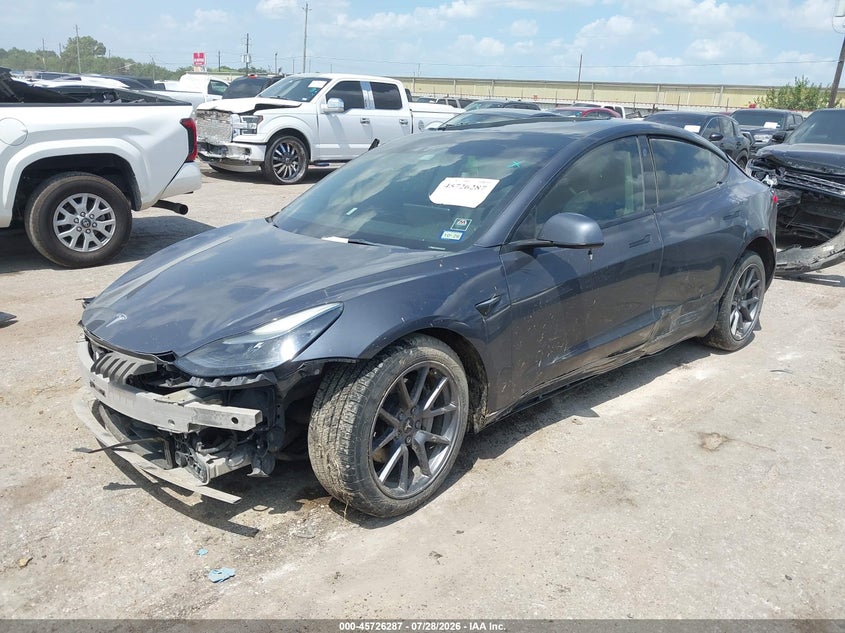 2022 Tesla Model 3, Rollover, IAAI, VIN 5YJ3E1EBXNF208037 — photo 2