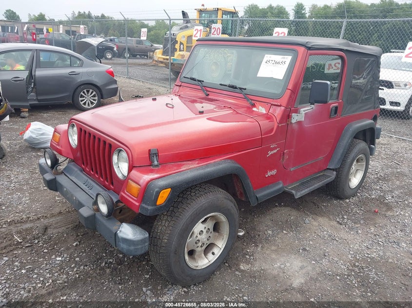 1999 Jeep Wrangler, Normal Wear & Tear, IAAI, VIN 1J4FY19S7XP486699 — photo 2
