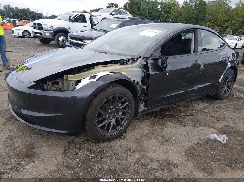 2025 Tesla Model 3, Left Front, IAAI, VIN 5YJ3E1EA4SF971710 — photo 2