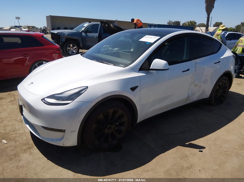2021 Tesla Model Y, Левый бок, IAAI, VIN 5YJYGDEE5MF287210 — фото 2