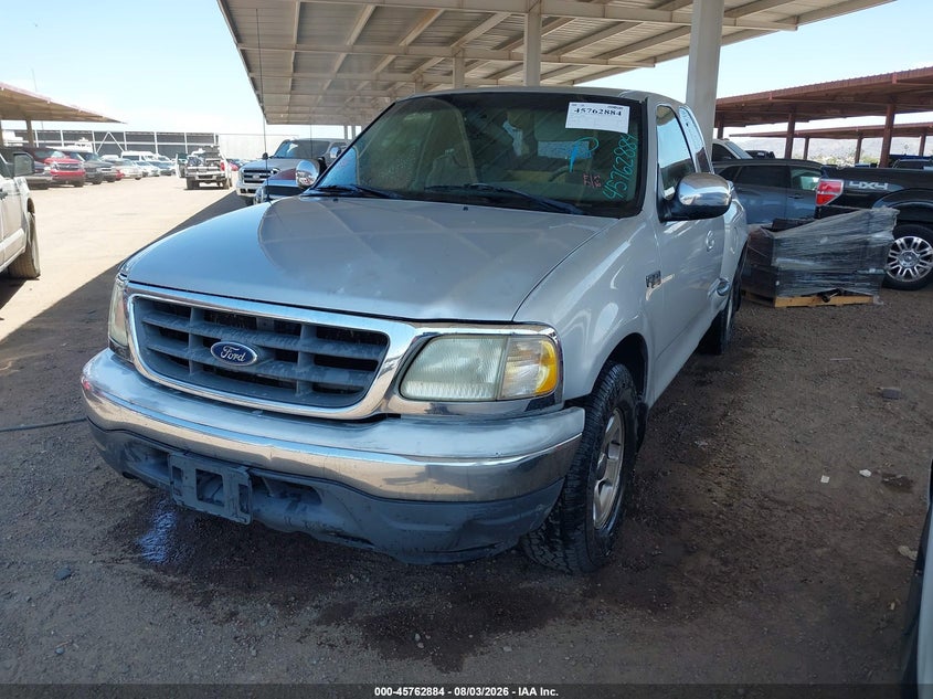 2002 Ford F-150, Normal Wear & Tear, IAAI, VIN 1FTRX07292KC45106 — photo 2