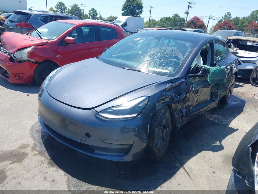 2023 Tesla Model 3, Left Side, IAAI, VIN 5YJ3E1EAXPF511927 — photo 2